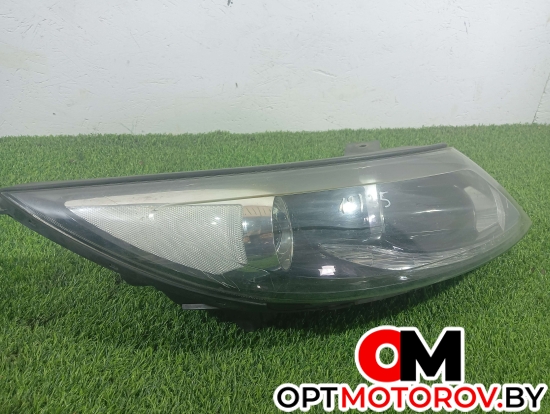 Фара левая  Kia Sportage 3 поколение 2012 921023u270 #1