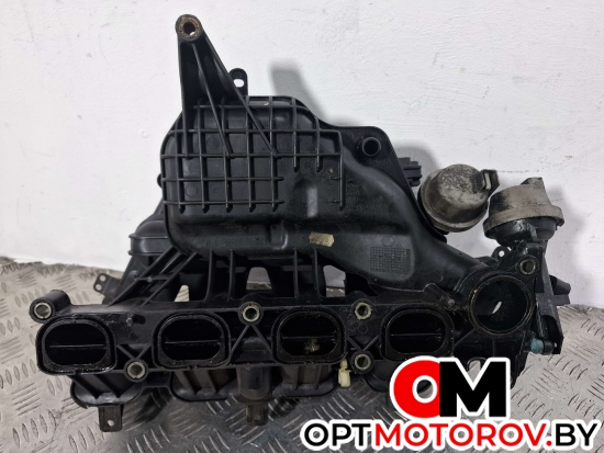 Впускной коллектор  Ford Focus 2 поколение 2007 4M5G9424FT #1