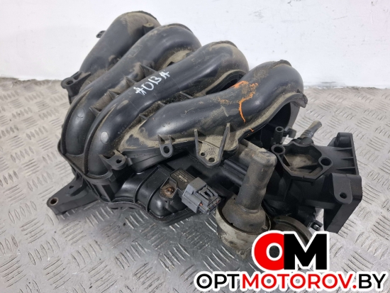 Впускной коллектор  Ford Focus 2 поколение 2007 4M5G9424FT #2