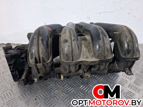 Впускной коллектор  Ford Focus 2 поколение 2007 4M5G9424FT #4