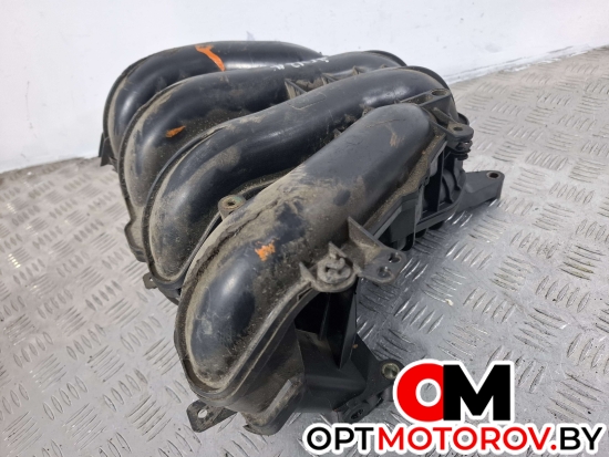 Впускной коллектор  Ford Focus 2 поколение 2007 4M5G9424FT #5