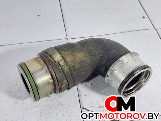 Патрубок турбины  Volkswagen Golf 5 поколение 2006 038131111A #1