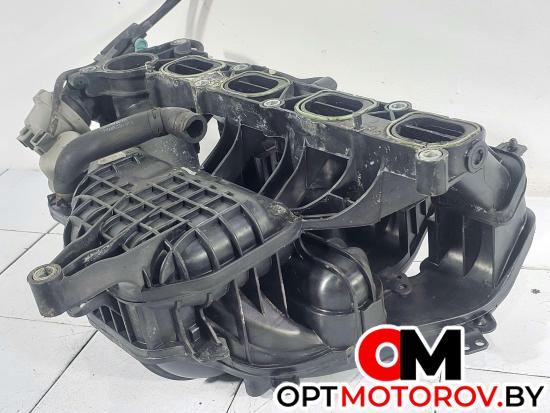 Впускной коллектор  Ford Focus 2 поколение 2007 4M5G9424FT #4