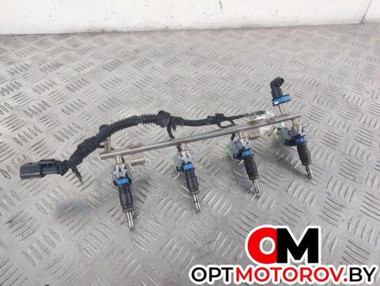 Форсунка топливная  Opel Astra J 2010 55562599 #1