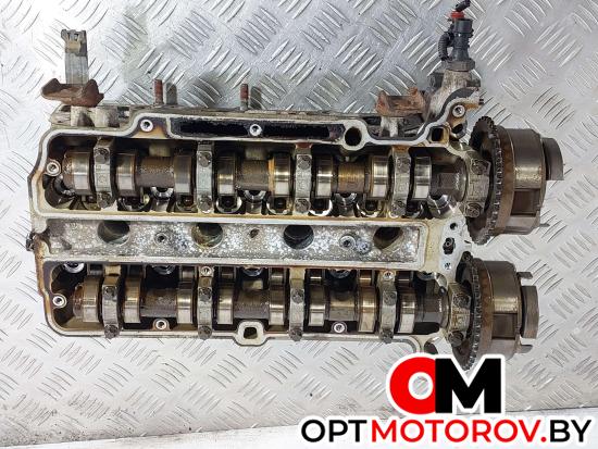 Головка блока цилиндров  Opel Astra J 2010 55562229, 55562225 #1