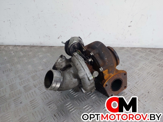 Фланец (тройник) системы охлаждения  Volkswagen Touareg 1 поколение 2005 030TC17542000 #4