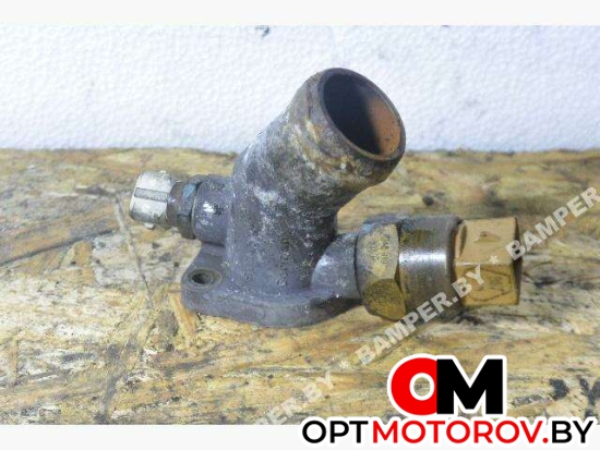 Фланец (тройник) системы охлаждения  Audi 100 4A/C4 1994 34121133 #1