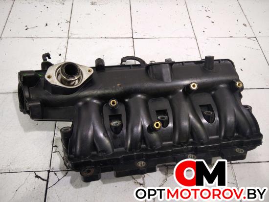 Впускной коллектор  Opel Corsa D 2008 55207034 #1