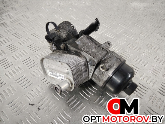 Корпус масляного фильтра  Hyundai Accent 3 поколение (MC) 2008 264102A100 #1